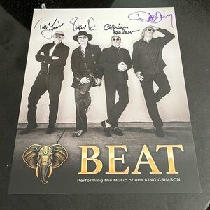 Poster by the band BEAT, which is King Crimson and it’s signed by king crimson
